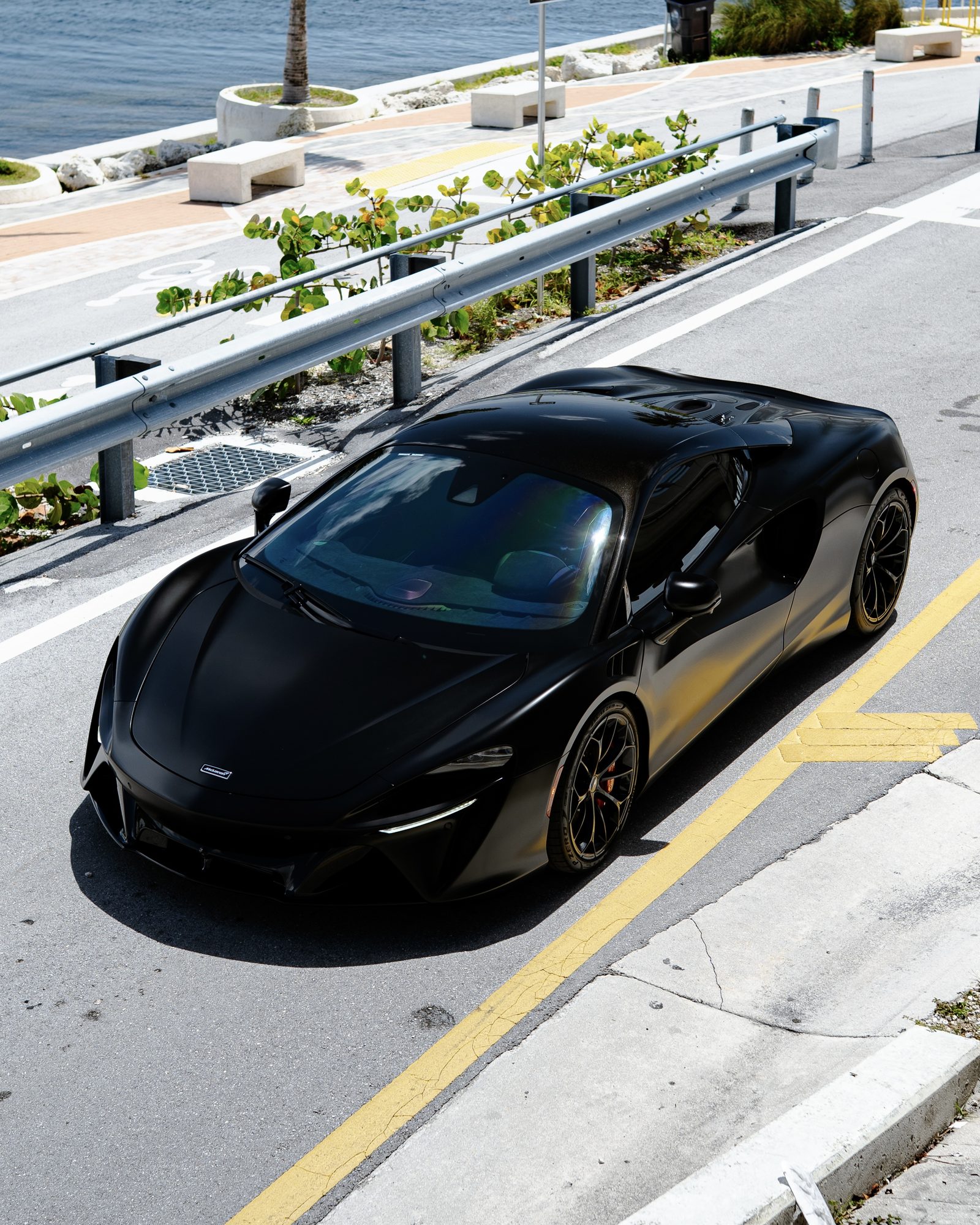 Gloss black McLaren with ceramic tinted windows, finished by Restyle Miami